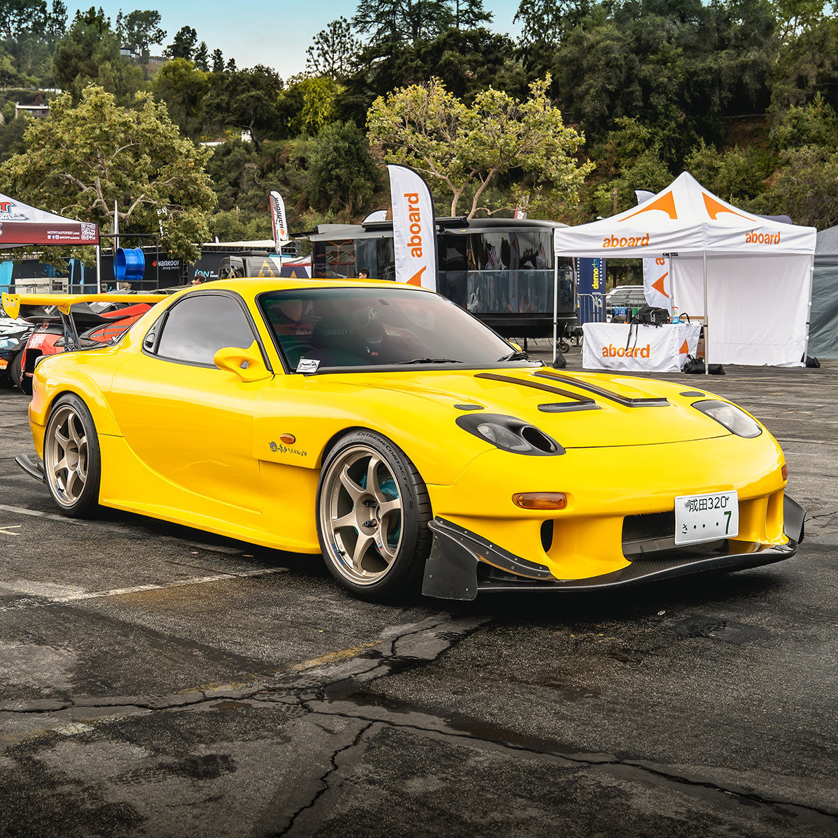Evan's yellow widebody Mazda RX-7 (FD), winner of Showoff's Best Import at Demo Days Festival Los Angeles.